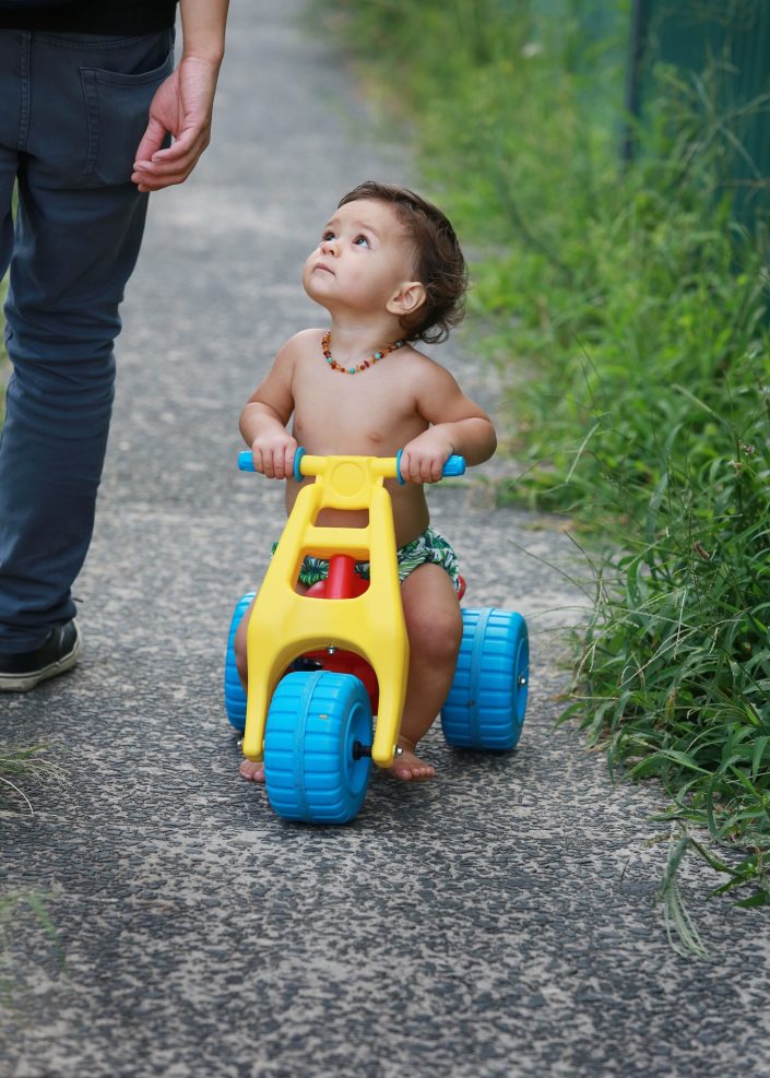 Young Boy Riding Bike