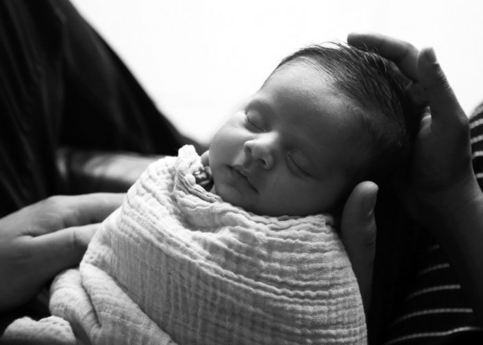 Sleeping Baby in Muslin Wrap